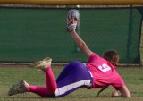 Lemoore's Sierra Phelps makes a spectacular catch in a recent game for the Tigers.